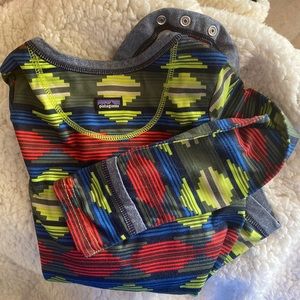18-24 Months Patagonia long sleeve onesie and 2 pairs of matching pants.